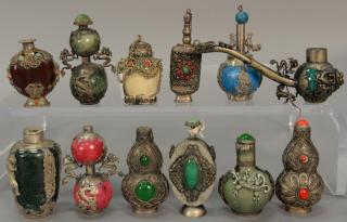 Appraisal: Twelve silver and jeweled mounted snuff bottles to include six