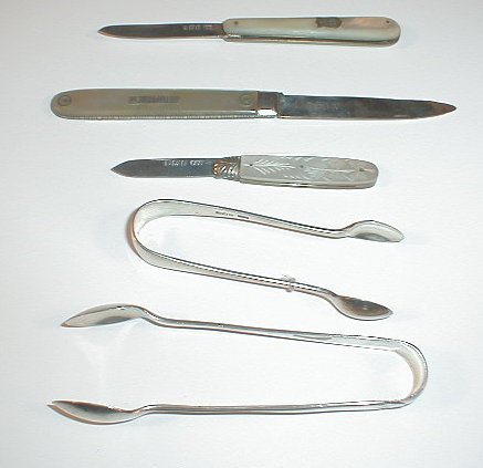 Appraisal: Two silver sugar nips and three late Victorian Edwardian silver