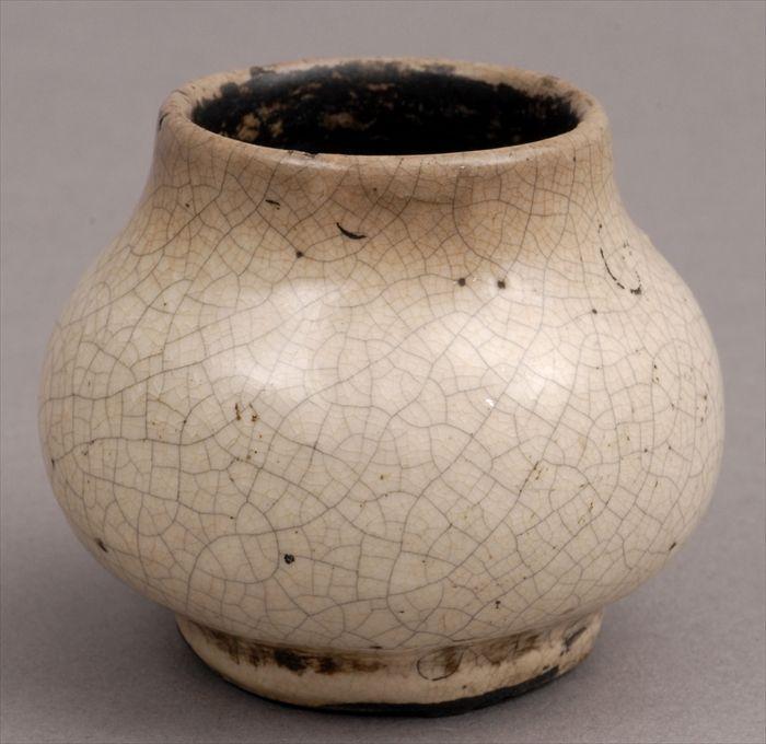 Appraisal: CHINESE CRACKLE-GLAZED MINIATURE JAR Of squat pear form with ring