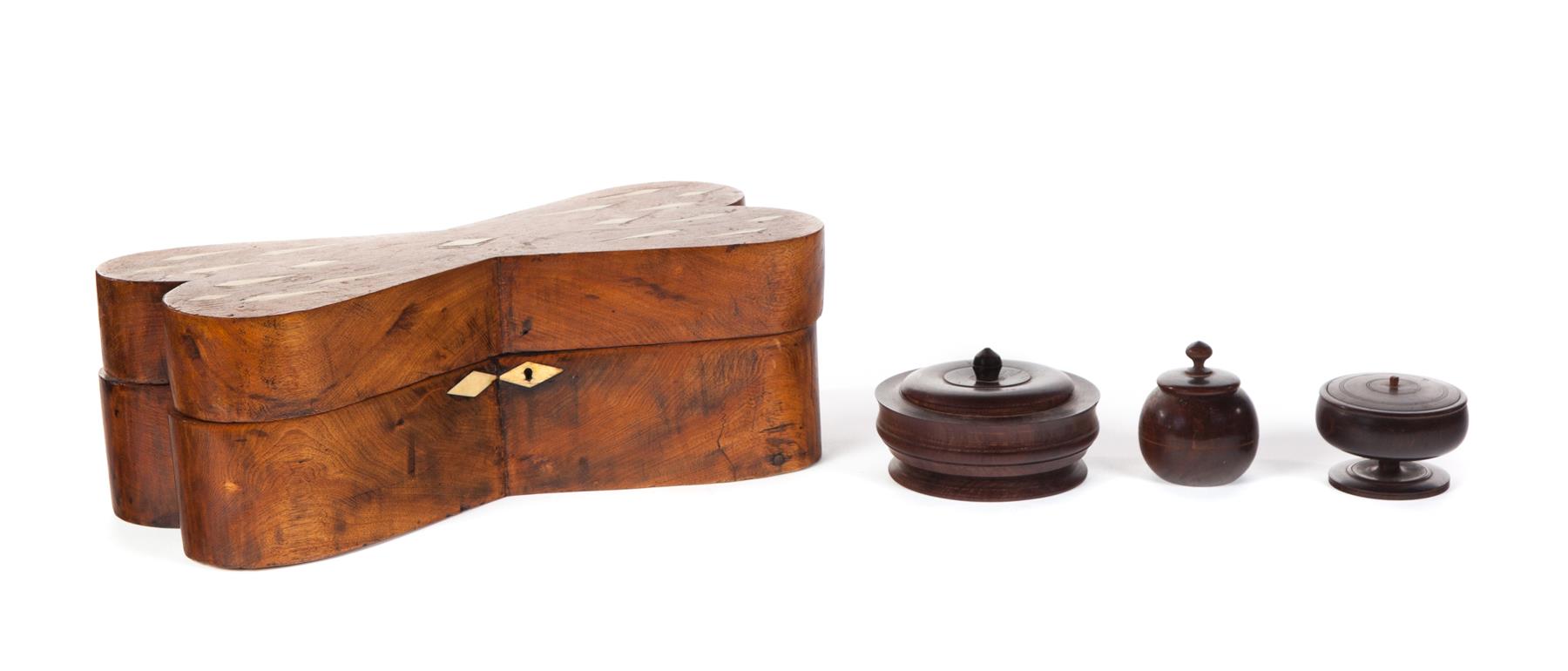 Appraisal: FOUR WOODEN BOXES Twentieth century Three turned lignum vitae lidded