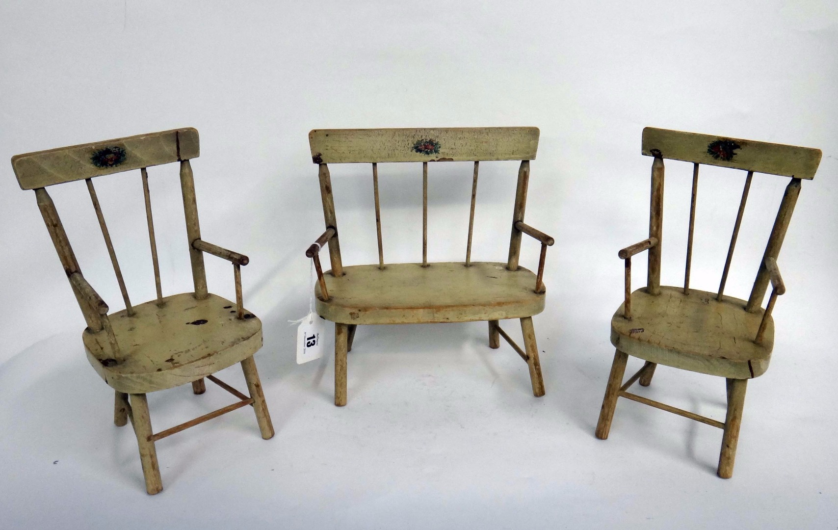 Appraisal: A doll's vintage painted wooden three-piece Windsor suite the settee