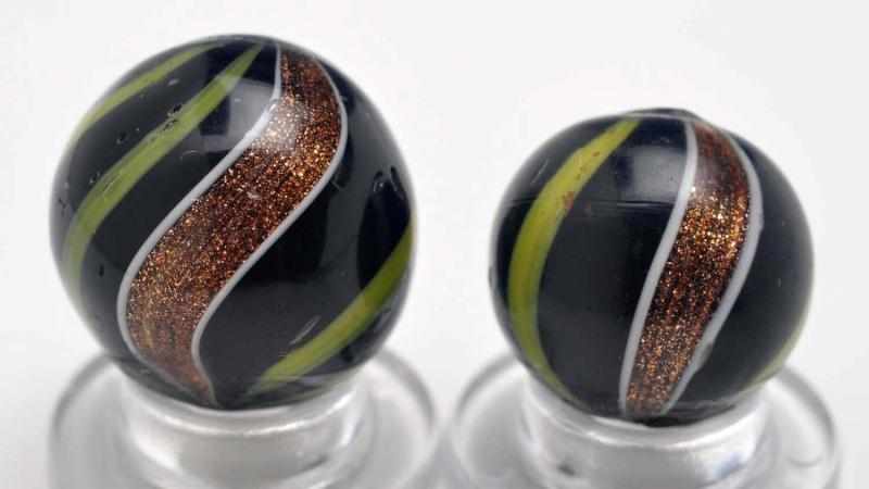 Appraisal: Lot of Black Opaque Banded Lutz Marbles Description Both have