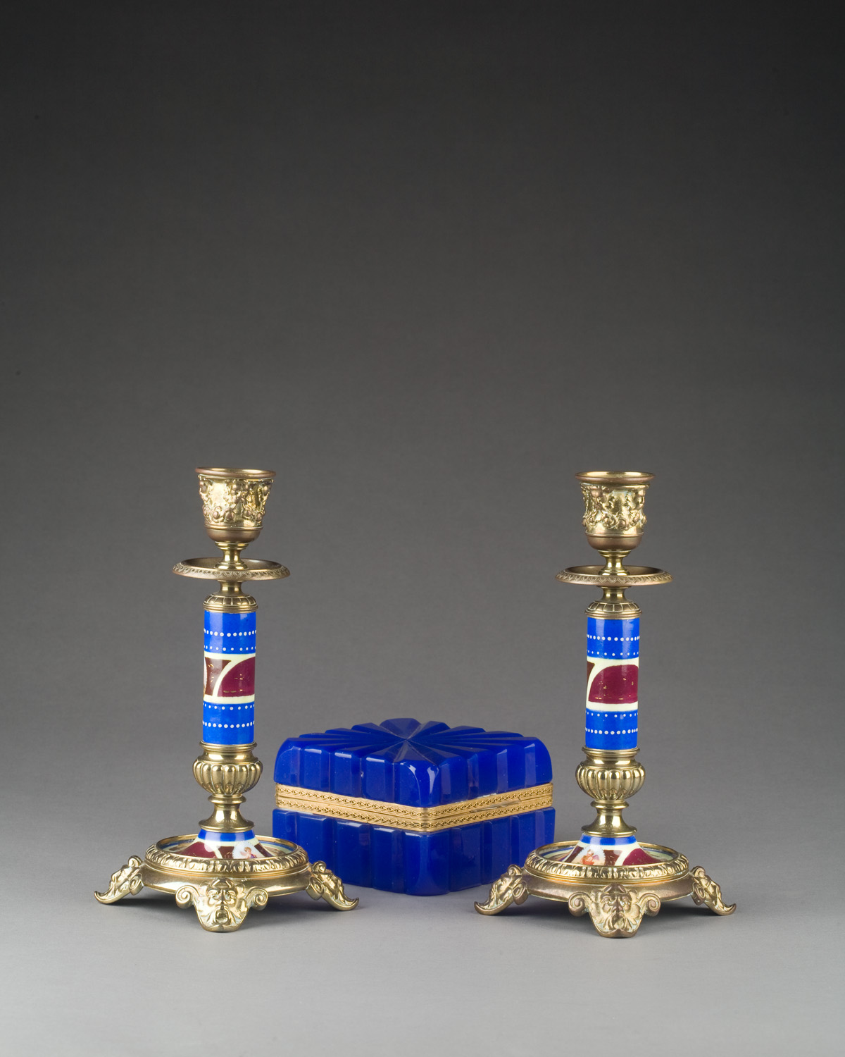 Appraisal: PAIR OF VIENNA PORCELAIN BRASS-MOUNTED CANDLESTICKS EARLY TWENTIETH CENTURY Together