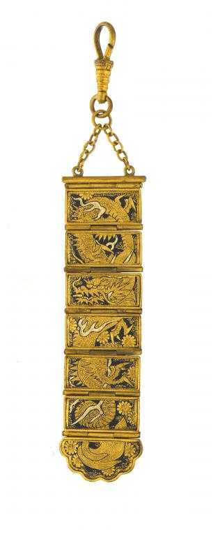 Appraisal: A SHAKUDO WATCH-FOB composed of seven hinged panels inlaid with