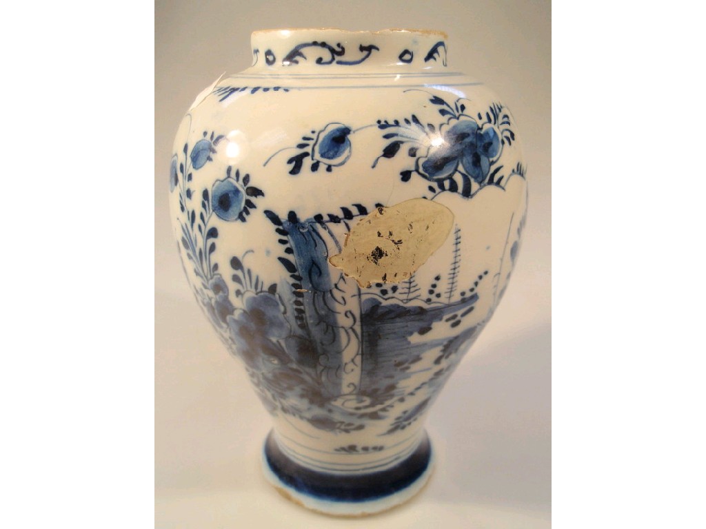 Appraisal: An thC Delft blue ovoid vase painted with parrots and