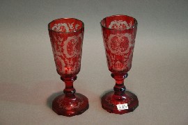 Appraisal: A pair of Bohemian ruby flash glasses