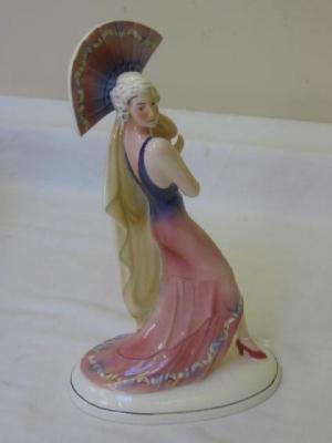 Appraisal: A KALZHUTTE ART DECO POTTERY FIGURE modelled as a dancer