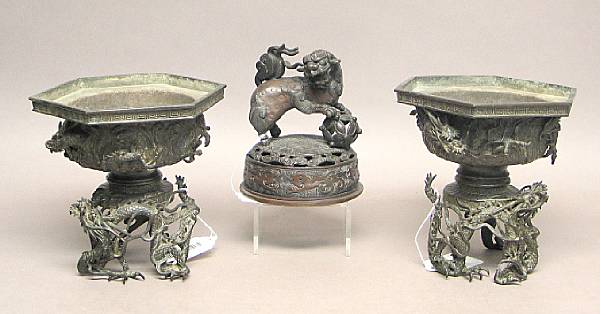 Appraisal: A pair of patinated bronze usabata Meiji Period Each of