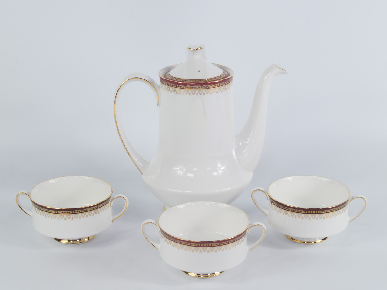 Appraisal: A Paragon porcelain part dinner and coffee service decorated in