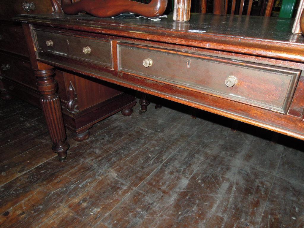 Appraisal: A th century mahogany writing table desk of rectangular form