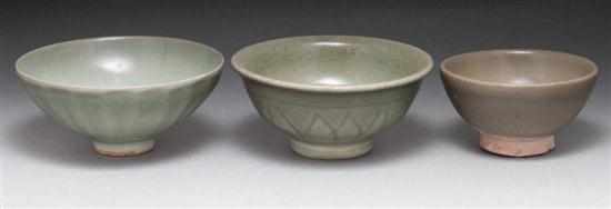 Appraisal: Three Chinese celadon glaze stoneware and earthenware footed bowls th-