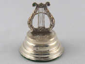 Appraisal: A silver lyre shaped menu holder Birmingham