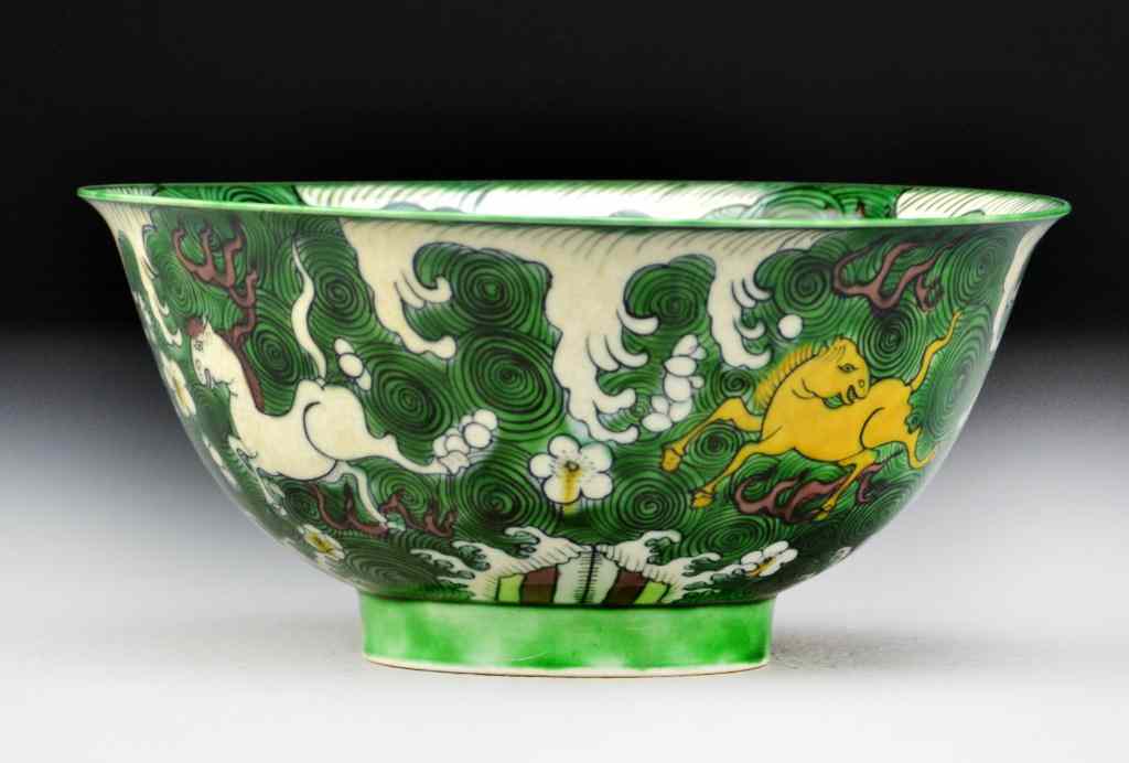 Appraisal: Chinese Sancai Glaze Porcelain BowlFinely painted to depict horses in