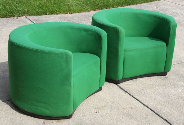 Appraisal: Pair Retro Mod s green upholstered tub chairs modern cylindrical