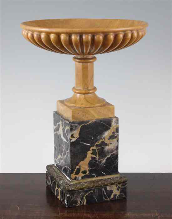 Appraisal: An early th century yellow marble fluted tazza on an