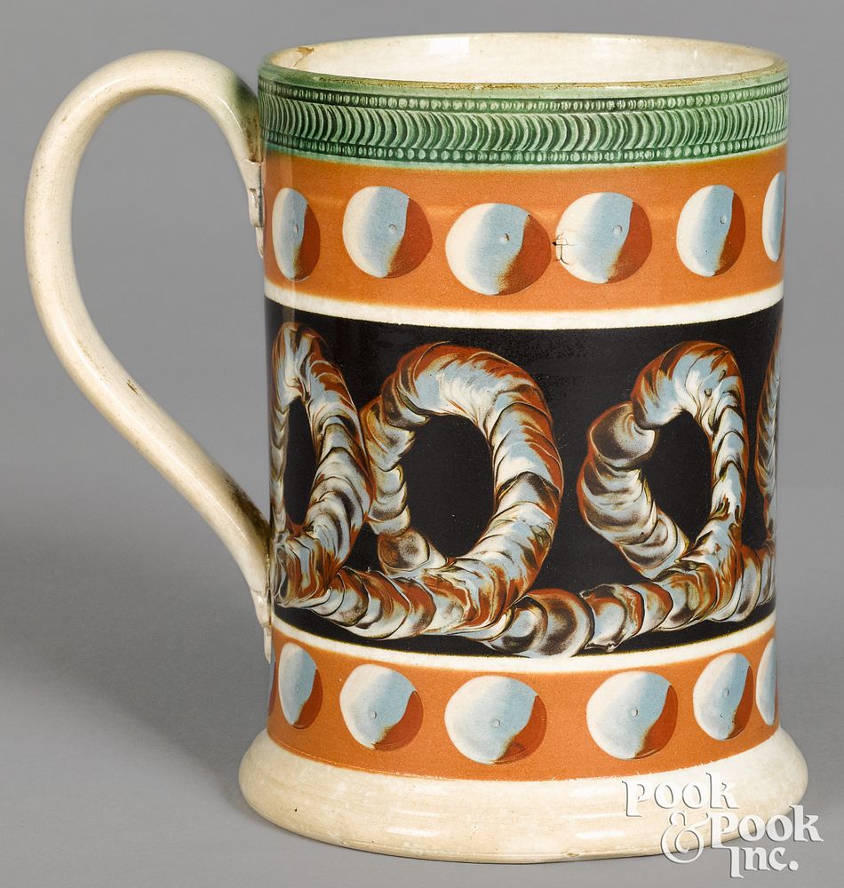 Appraisal: Mocha mug Mocha mug with earthworm and cats-eye decoration h