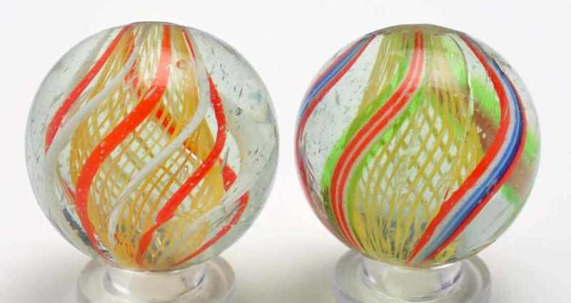 Appraisal: Lot of Yellow Latticino Swirl Marbles Description Includes one with