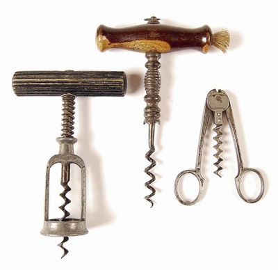 Appraisal: A corkscrew with a turned handle and shank with a