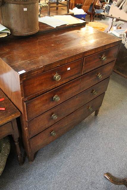 Appraisal: A LATE GEORGIAN MAHOGANY CHEST of two short and three