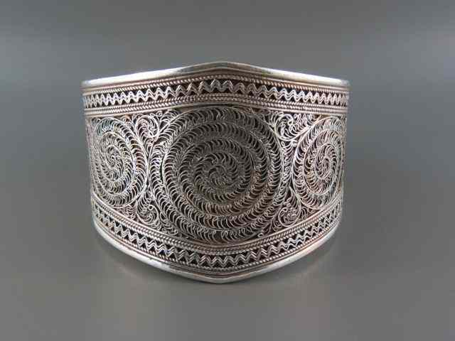 Appraisal: Sterling Silver Bracelet elaborate circular rococo and beaded design cuff