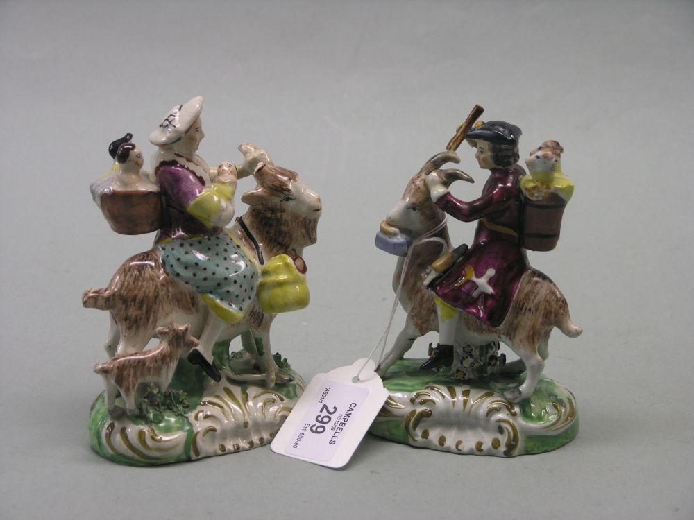 Appraisal: A pair of mid th century Staffordshire pottery figure groups