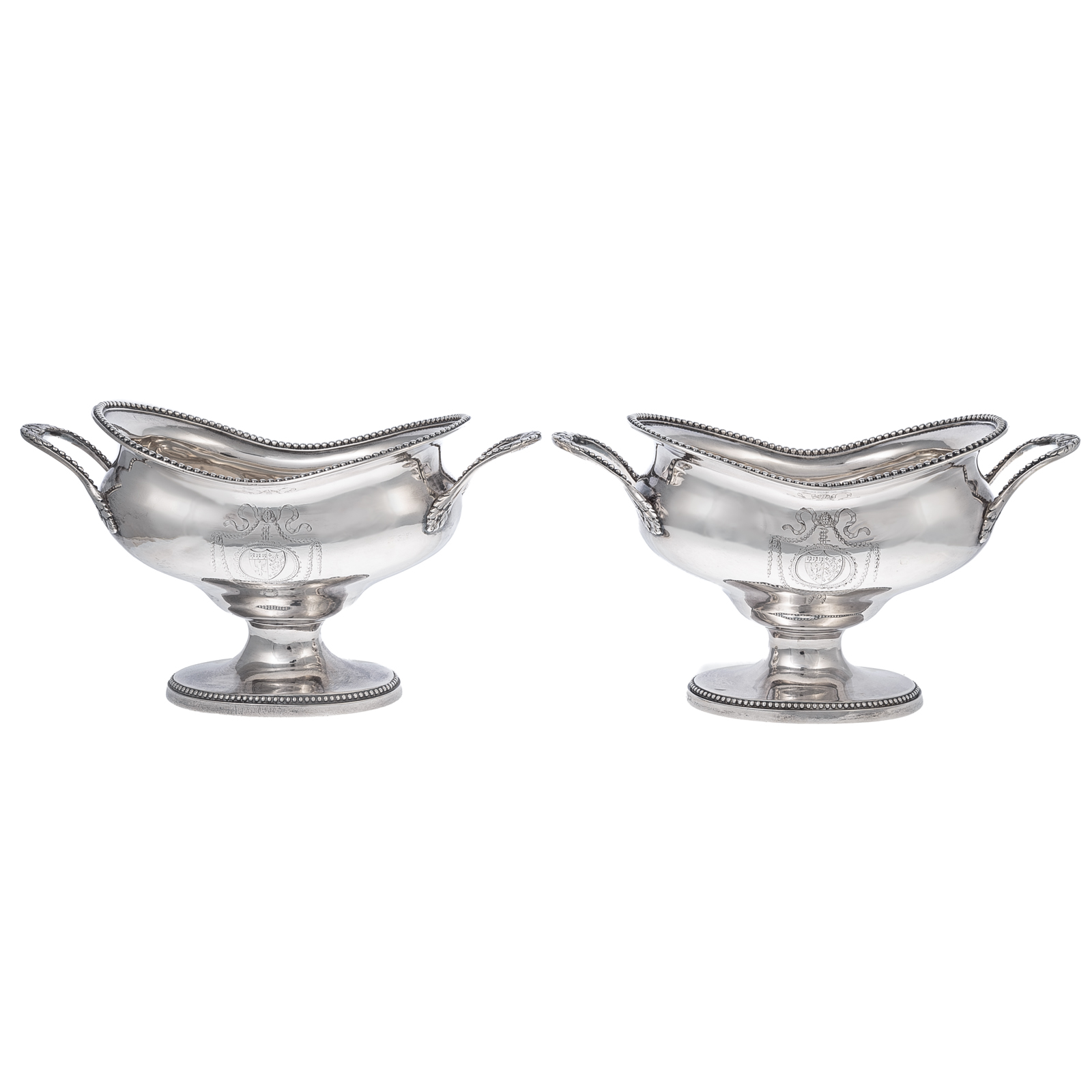 Appraisal: A PAIR OF GEORGE III ARMORIAL SAUCEBOATS Robert Jones John