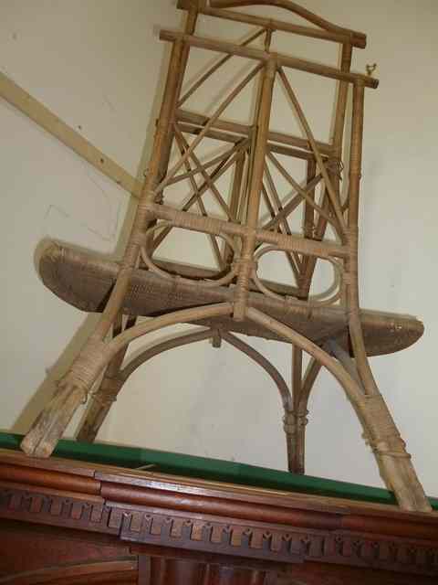 Appraisal: AN EARLY TH CENTURY RATTAN MAGAZINE RACK high