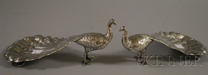 Appraisal: Pair of Silver Plated Peacock-form Table Ornaments