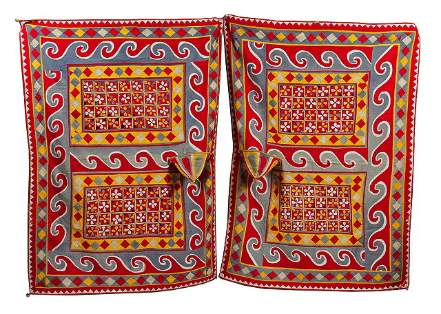 Appraisal: A PAIR OF INDIAN MULTI COLOURED APPLIQUE WORK BULLOCK COVERS