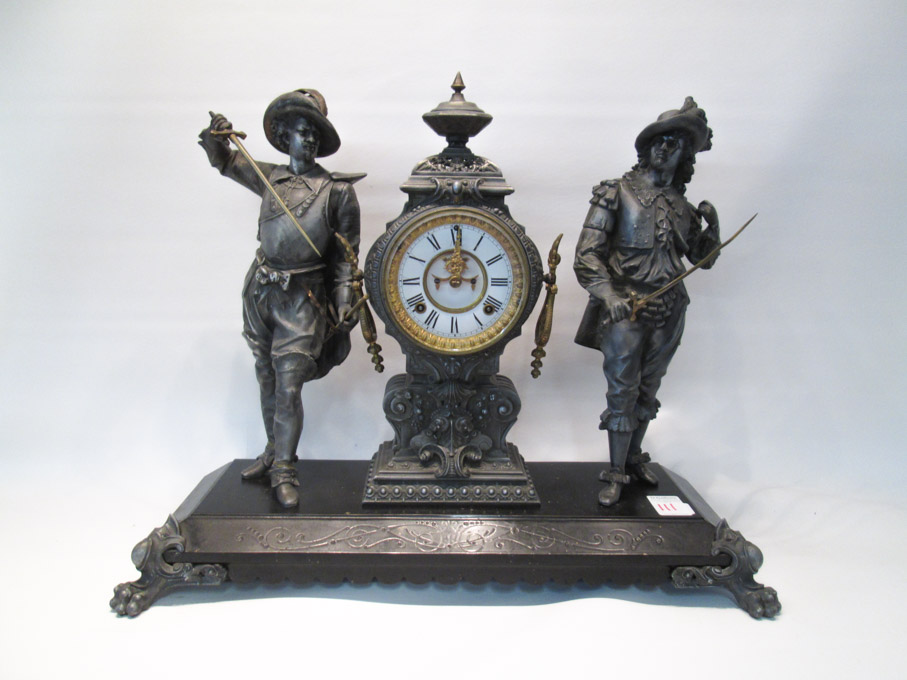 Appraisal: AMERICAN SPELTER DOUBLE STATUE MANTEL CLOCK with swordsmen flanking clock