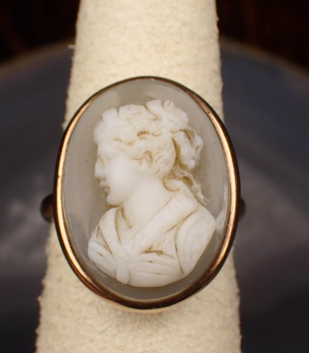 Appraisal: CAMEO AND TEN KARAT YELLOW GOLD RING bezel set with