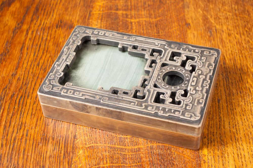 Appraisal: CHINESE CARVED INK STONE three-pieces rectangular form with brown pierced