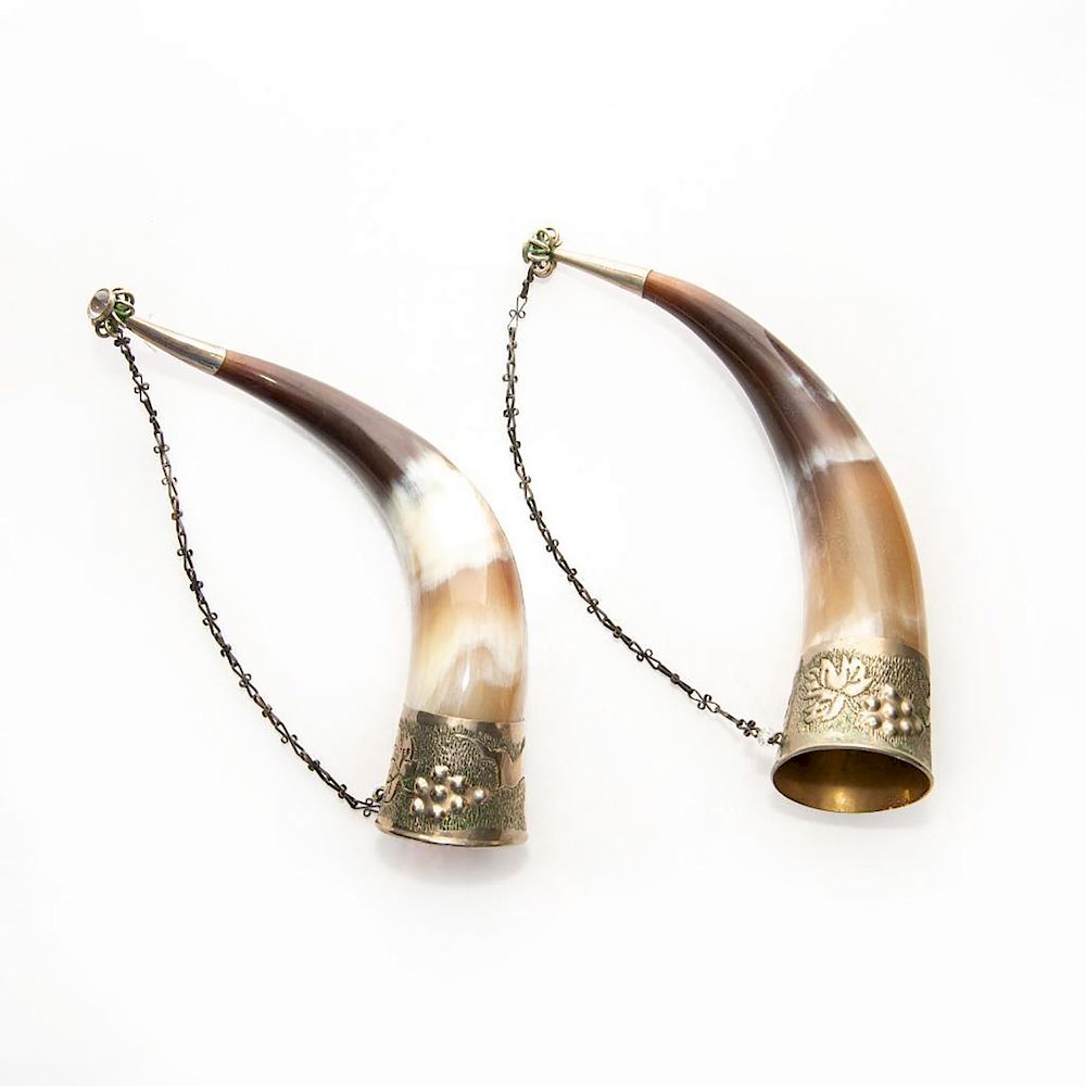 Appraisal: DRINKING HORN WITH WINERY VINES DECOR Chained handle with hand