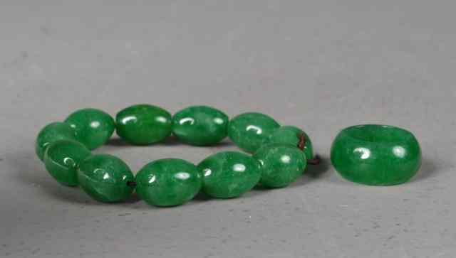 Appraisal: Pcs Chinese Jade Bracelet and RingFinely polished spinach jade bracelet