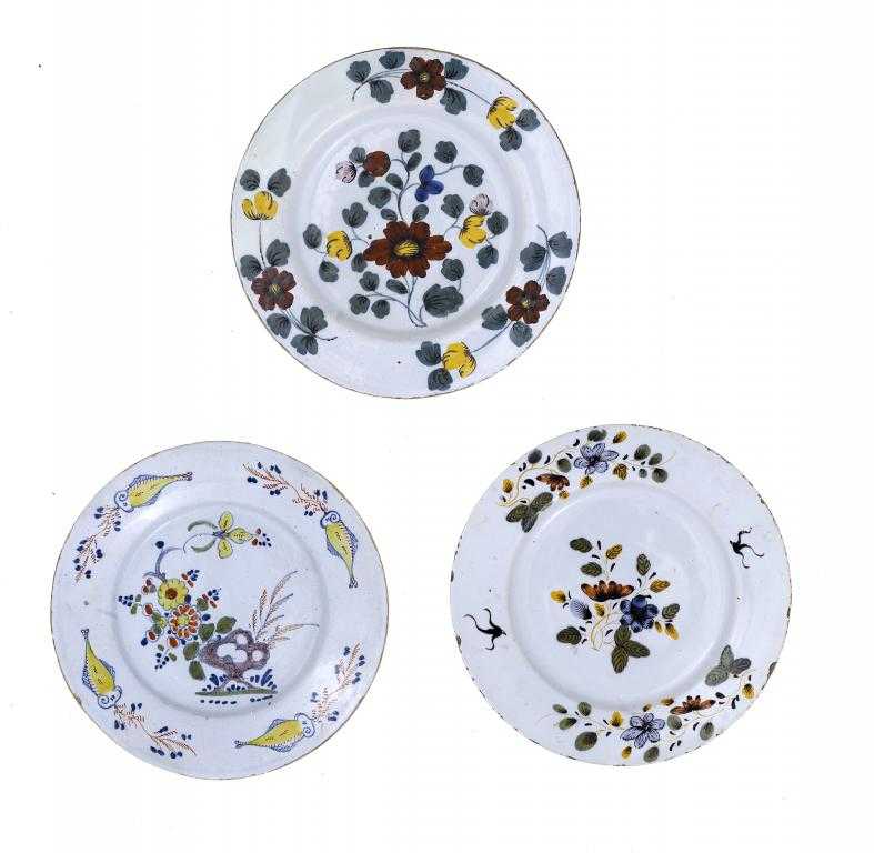 Appraisal: TWO ENGLISH DELFTWARE POLYCHROME PLATES LIVERPOOL OR BRISTOL painted in