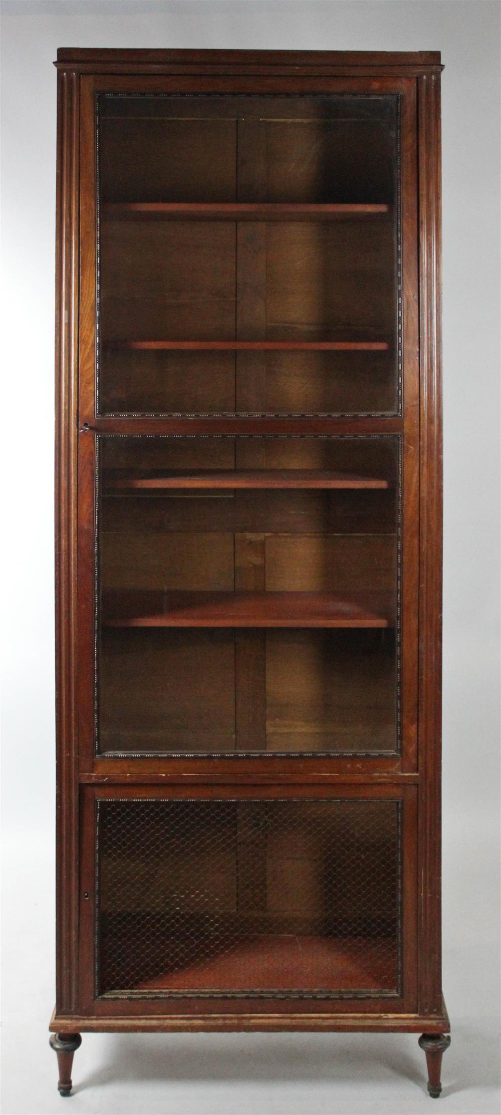 Appraisal: FRENCH EMPIRE STYLE CARVED MAHOGANY BIBLIOTHEQUE with a tall and