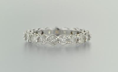 Appraisal: A Diamond Eternity Band Nineteen diamonds weighing apprx total weight