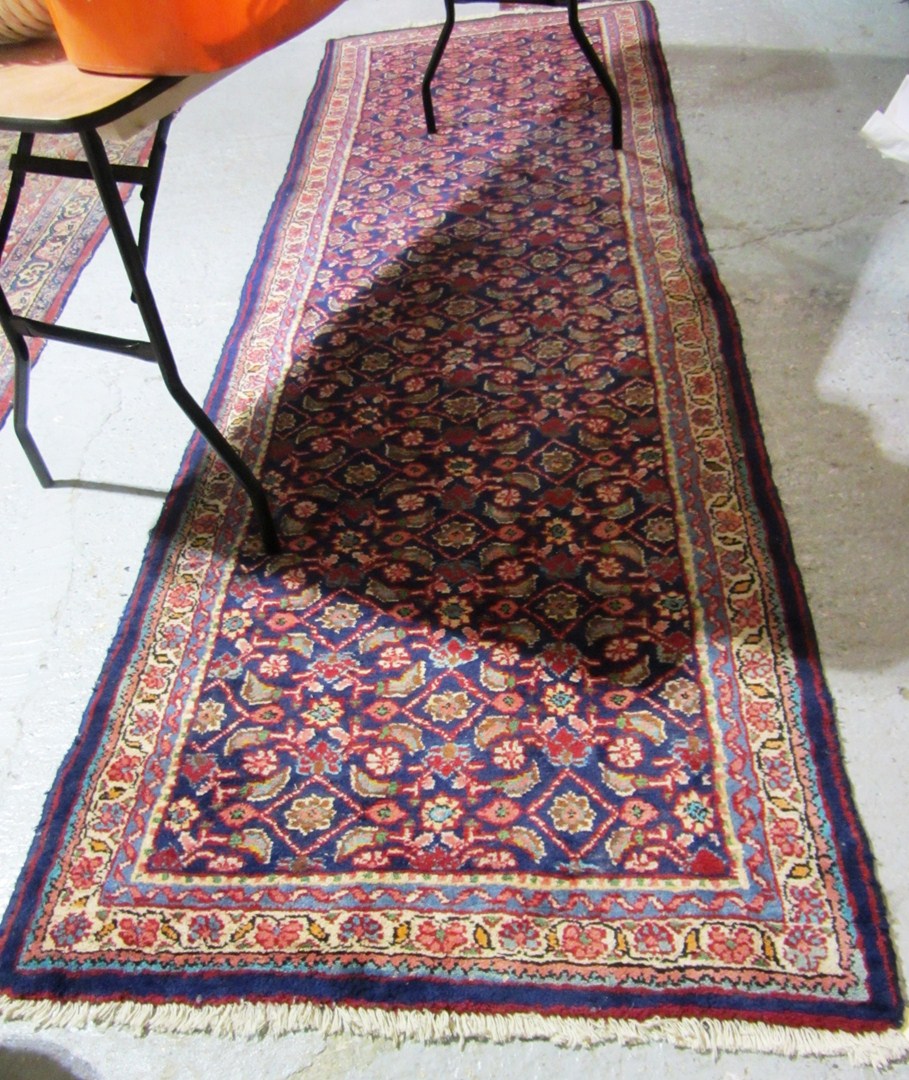 Appraisal: A th century blue ground Persian style runner