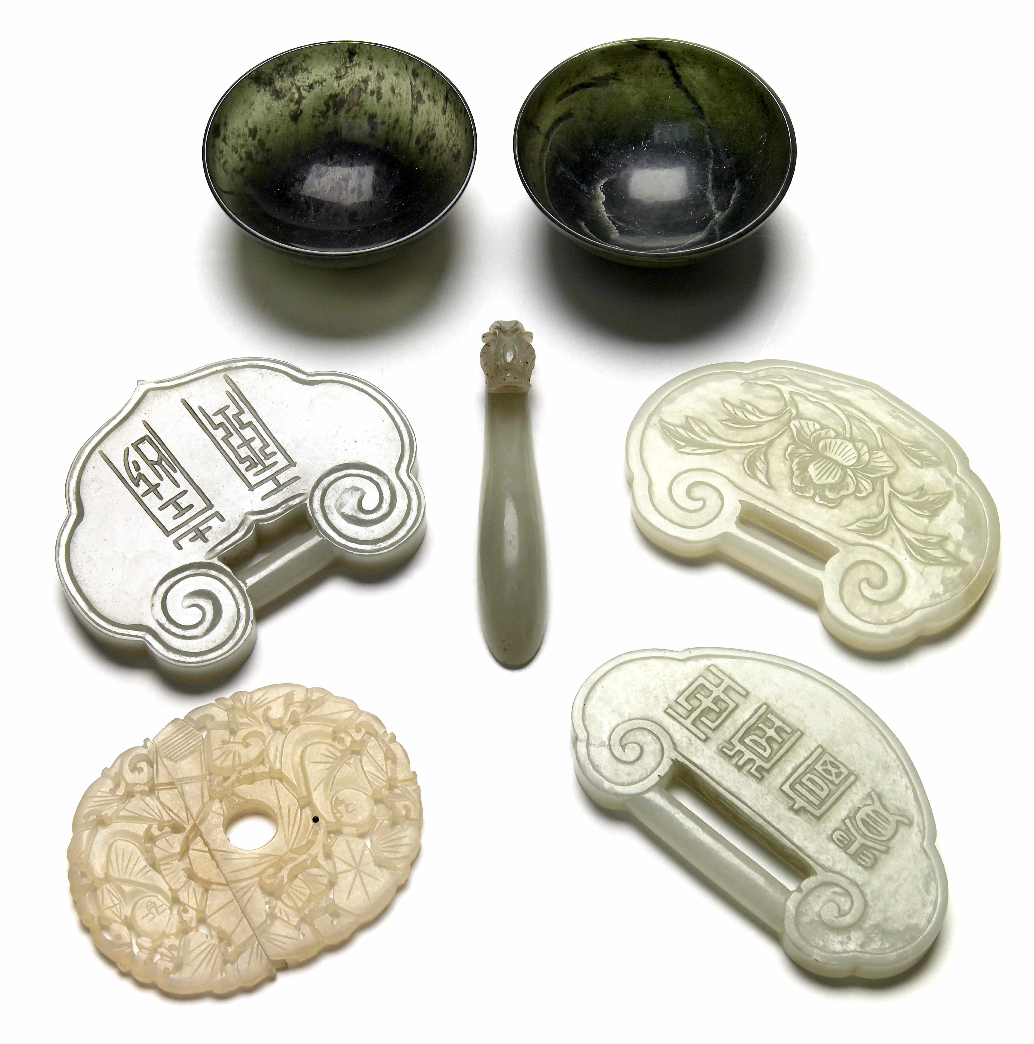 Appraisal: A group of seven Chinese carved nephrite jade and hardstone