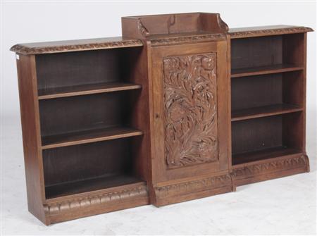 Appraisal: A mahogany carved open bookcase the acanthus carved top with