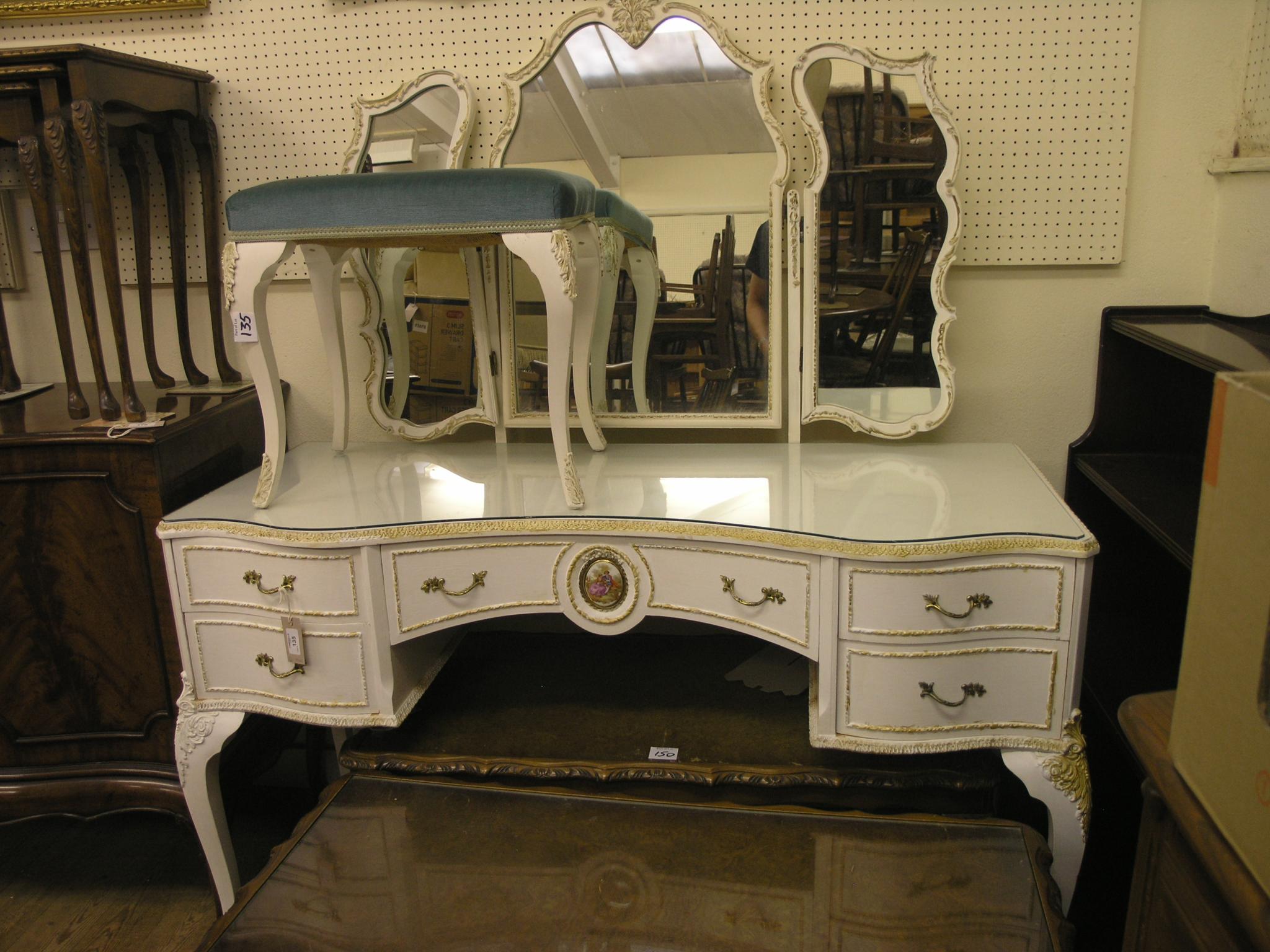 Appraisal: A Louis-style white-painted dressing table serpentine-fronted with folding mirrors and