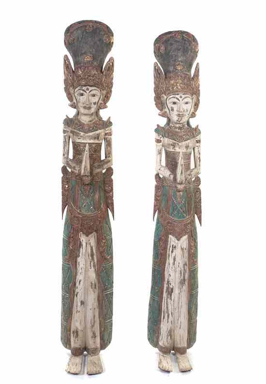 Appraisal: A Near Pair of Balinese Wood Carvings of Goddesses each