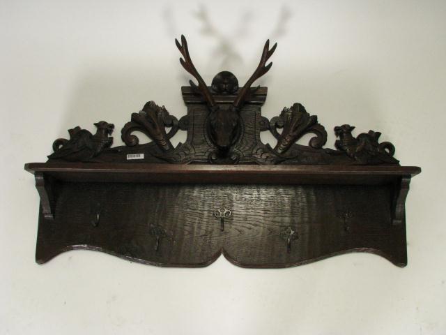 Appraisal: Black Forest Style Carved Oak Hat Rack Deer head with