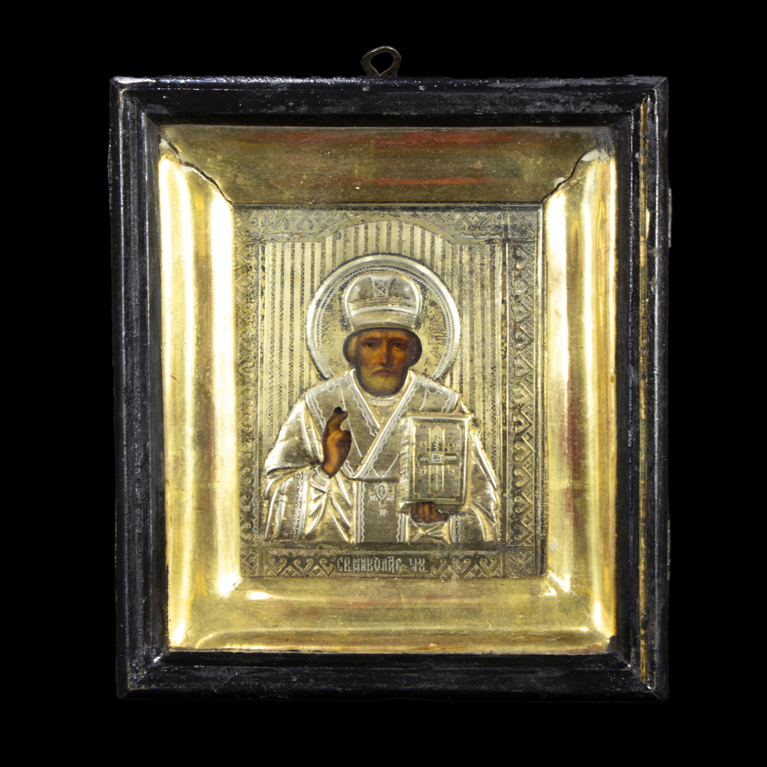 Appraisal: A RUSSIAN SILVER GILT OKLAD ICON OF ST NICHOLAS A