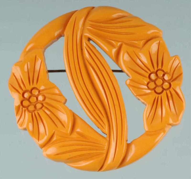 Appraisal: Bakelite Round Floral Butterscotch Pin Condition Excellent Size - L