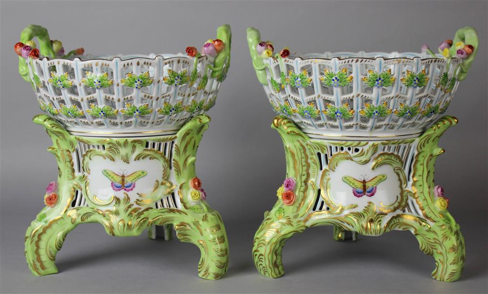 Appraisal: TWO HEREND 'QUEEN VICTORIA' PATTERN BASKETS ON STANDS blue printed