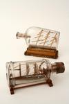 Appraisal: SHIPS IN BOTTLES - Two ships in bottles - Three