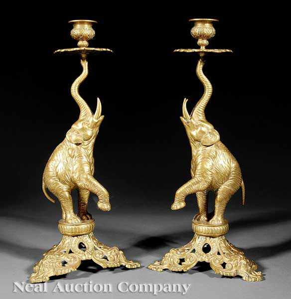 Appraisal: A Pair of French Brass Figural Candlesticks c - marked