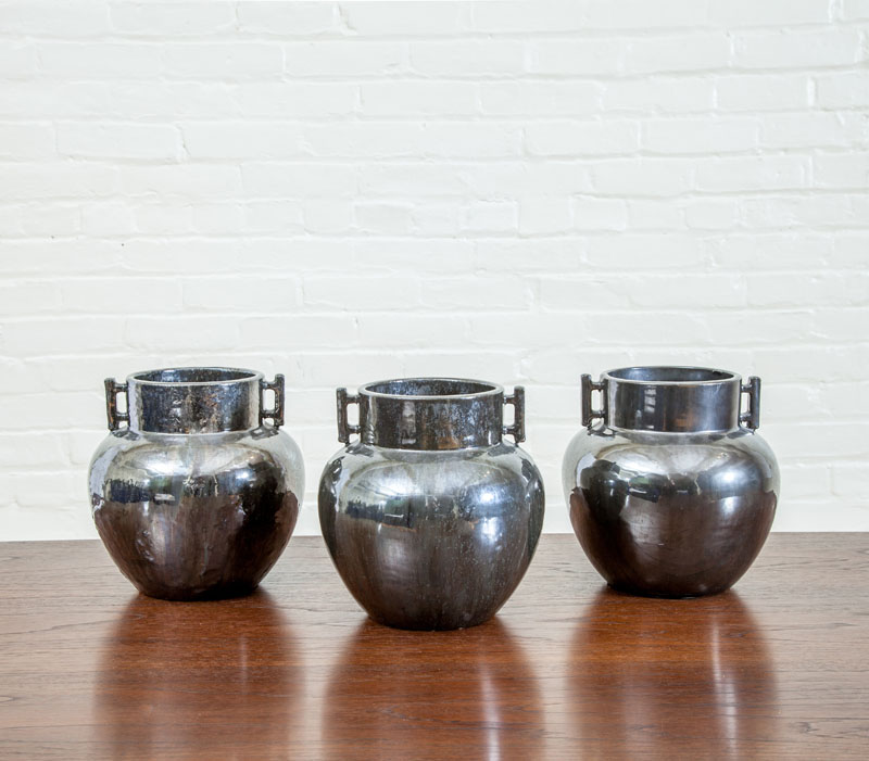 Appraisal: THREE FULPER MIRROR BLACK GLAZED JARS Marked x in diam