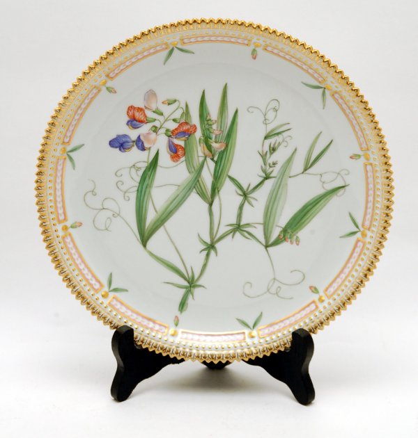 Appraisal: Flora Danica plate handpainted with flowers gilded sawtooth rim marked